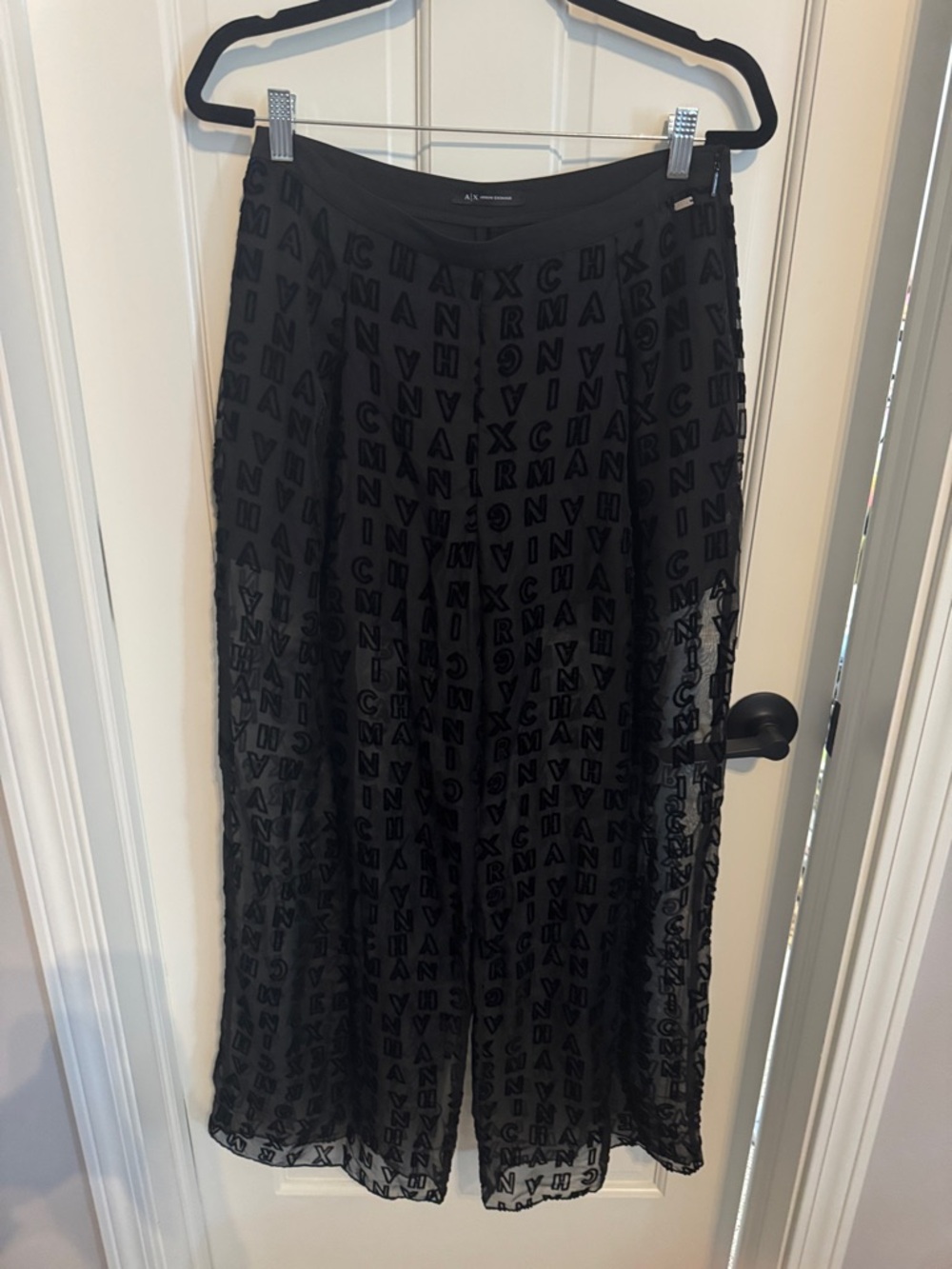 Armani Exchange Black Semi-Sheer pants with Logo Overlay.